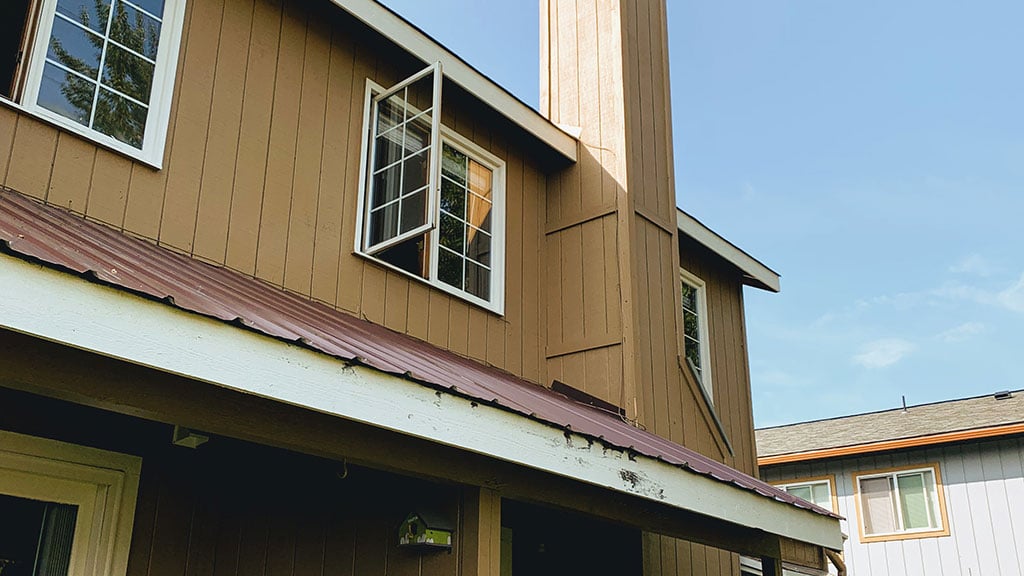 View of home exterior with new siding.