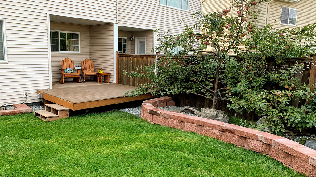 Landscaped, completed backyard with back deck of Multi Project Residential project.