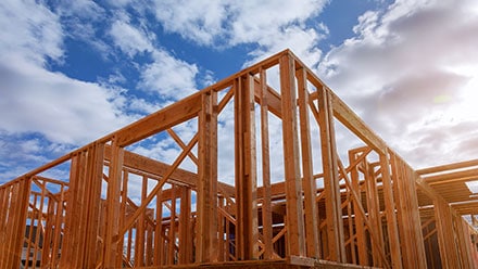 Framed building under construction.